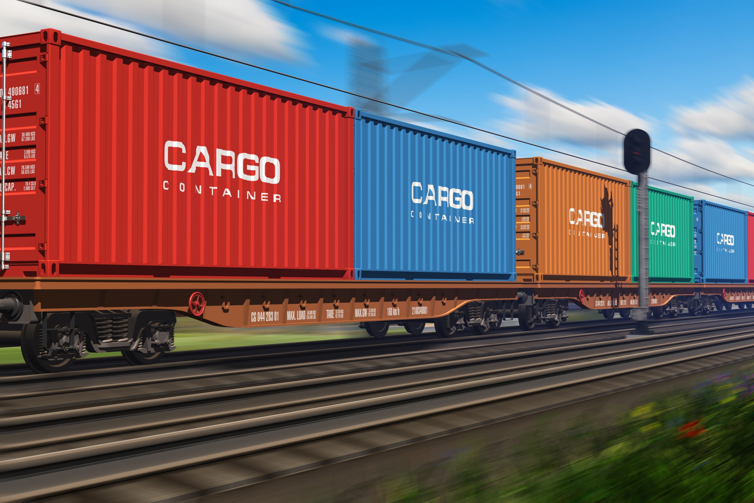 Rail freight: Colorful containers on a moving freight train
